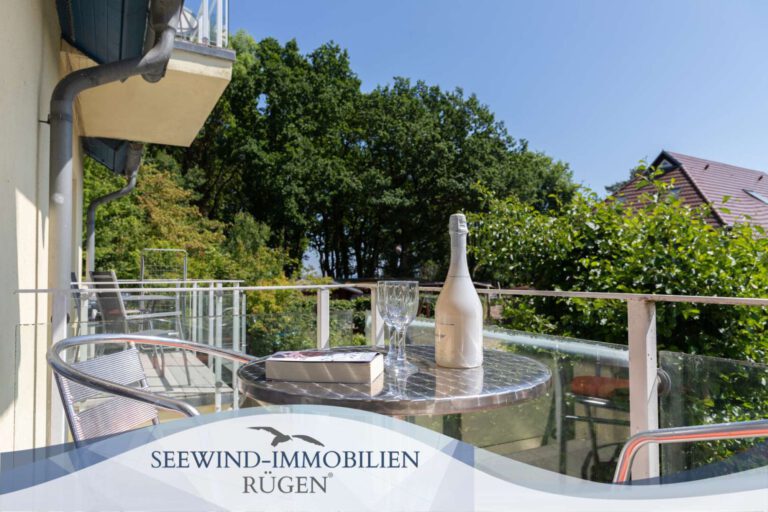 Maisonette-Wohnung mit seitlichem Wasserblick und privatem Strandzugang in Lobbe